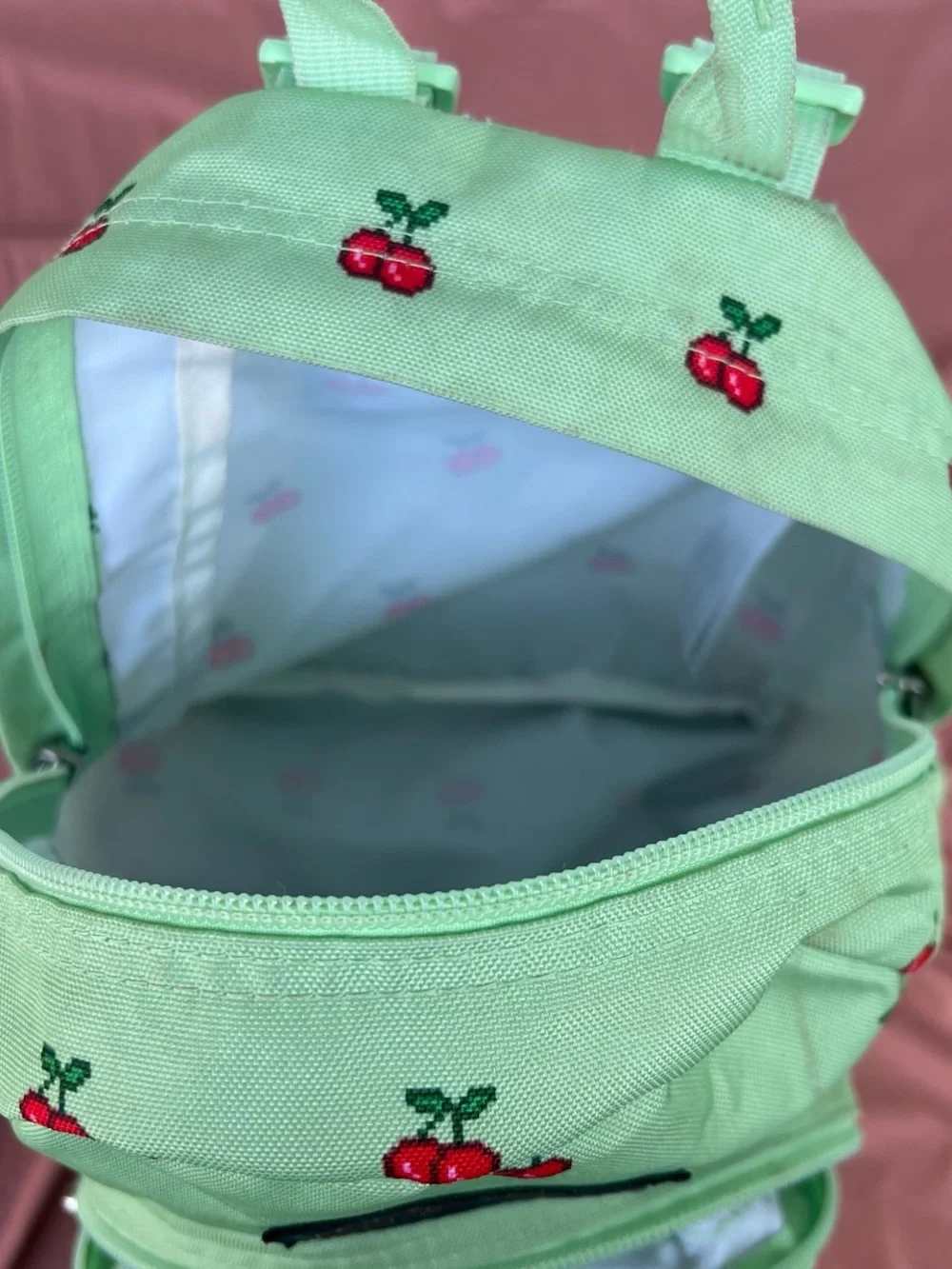 Jansport Mint Green Kids Backpack with Red Cherry Print